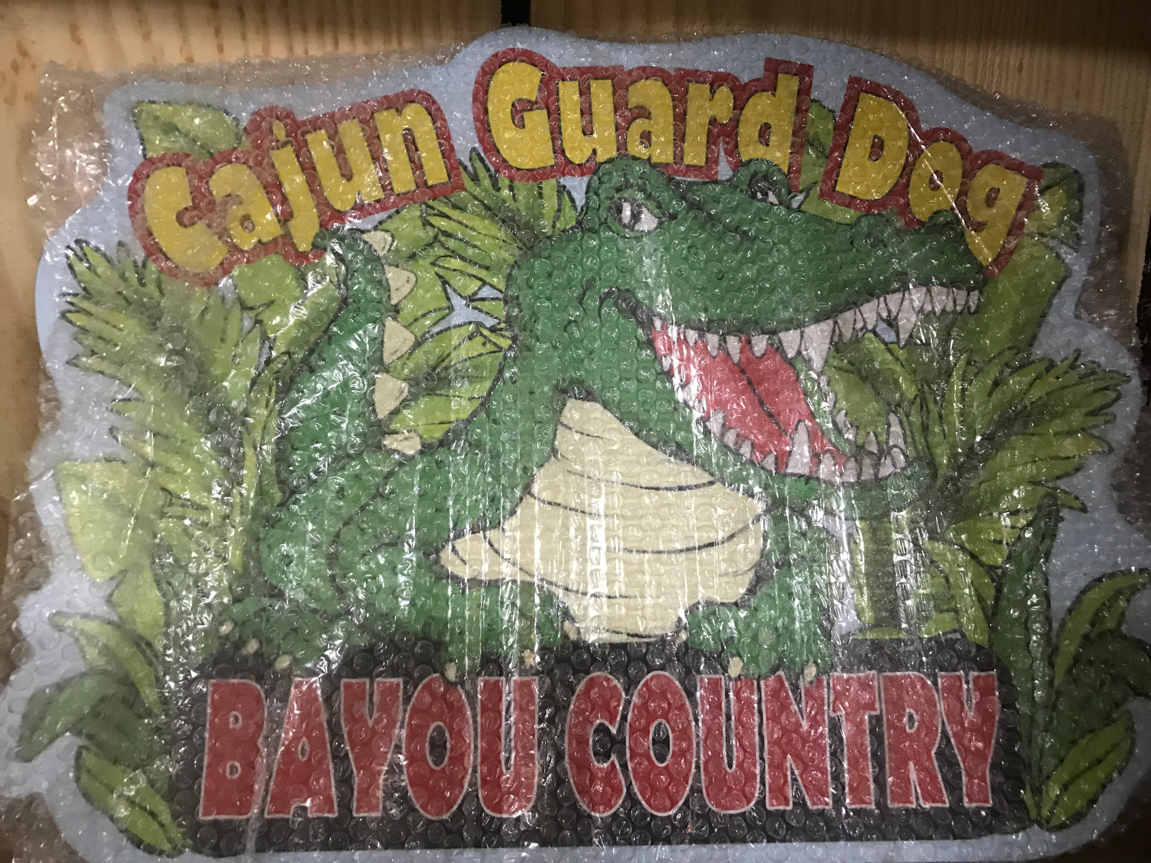 Cajun guard dog sign